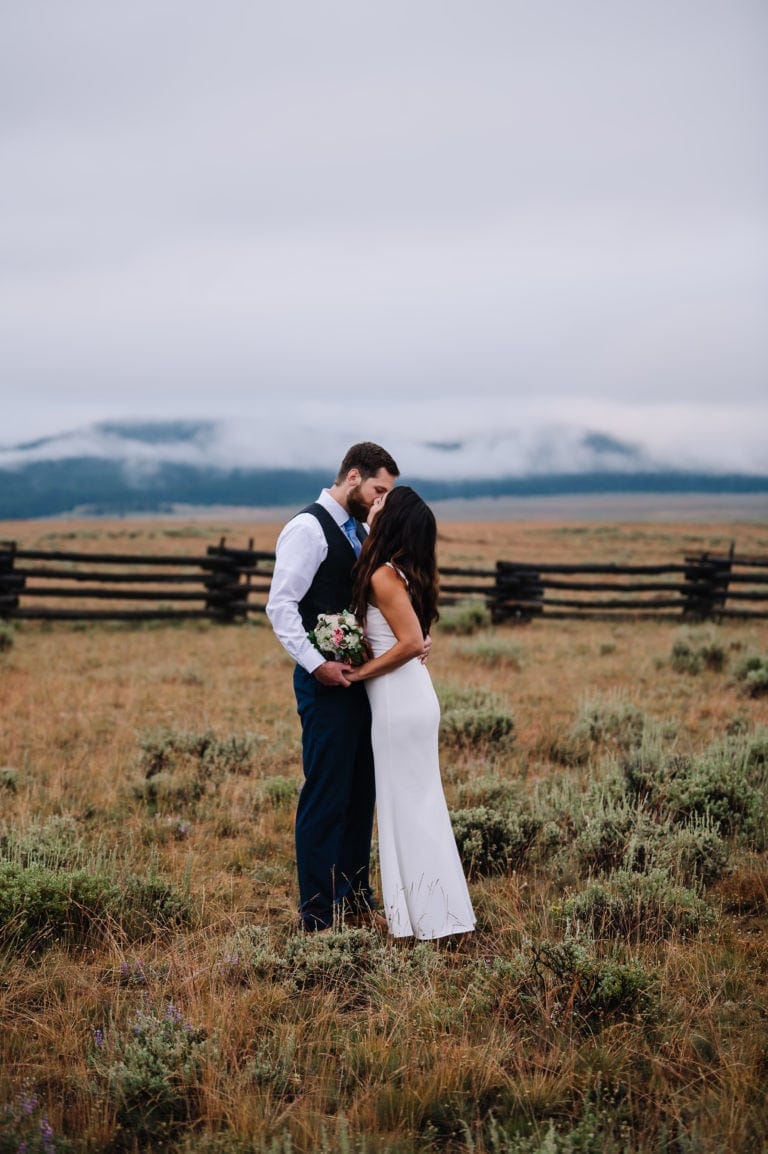Elopement couple kisses after their sawtooth mountain elopement.