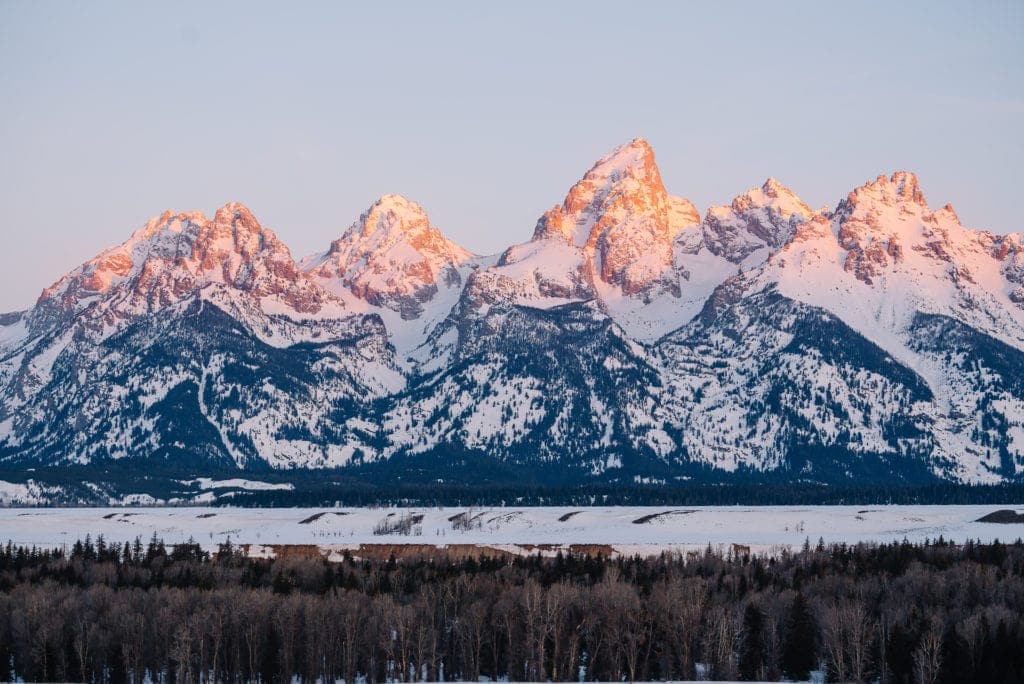 Wyoming is one of the easiest states to get married in. Landscape photo of the Grand Teton Mountain at sunrise. 
